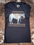 Flat lay of the old Town Road Western Tee by itself on cowhide